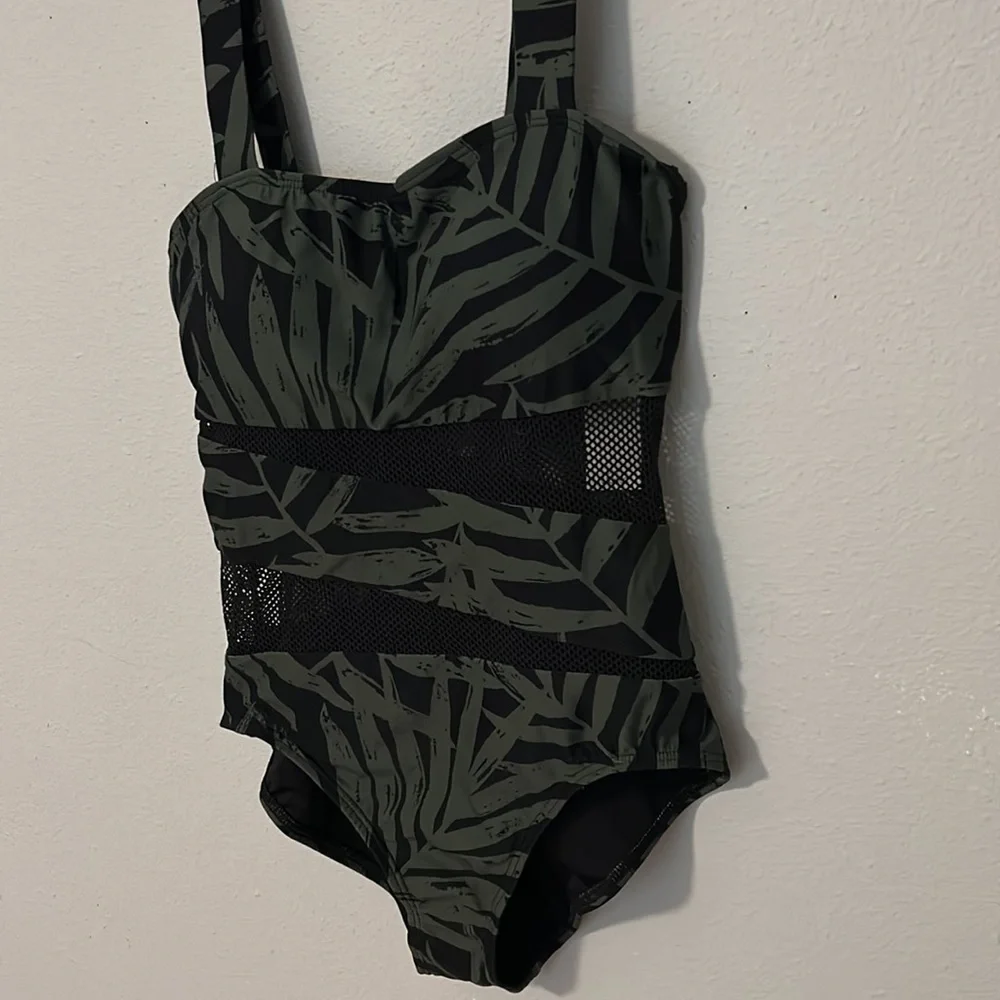NWT Carmen Marc Valvo one piece swimsuit. Black w/green palms, mesh, size 12.